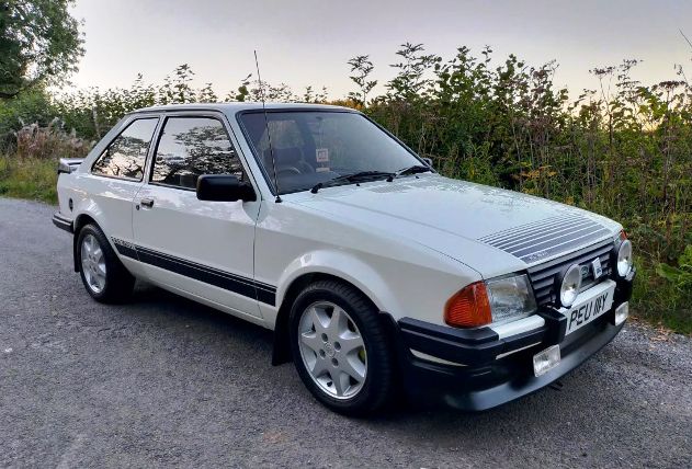 Click Here to read more of Christopher Frost's 1983 Escort RS
